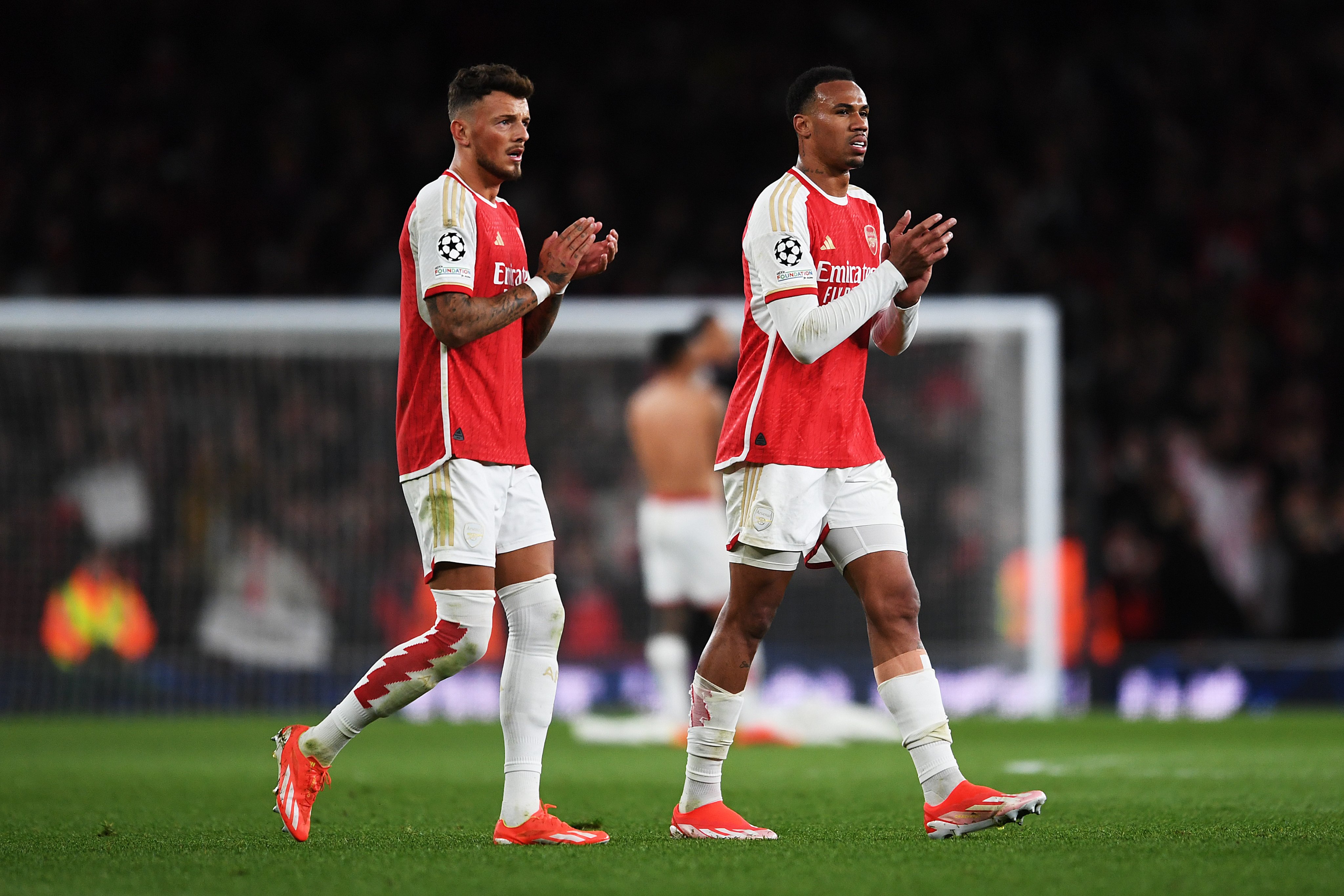 Ben White and Gabriel applaud the home faithful.