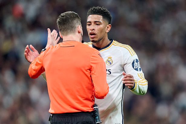 Jude Bellingham confronts referee Francois Letexier