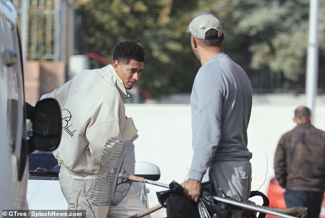 Jude Bellingham clutches a £1,500 Goyard washbag as he runs errands back in  Madrid after pulling out of the England squad through injury | Daily Mail  Online