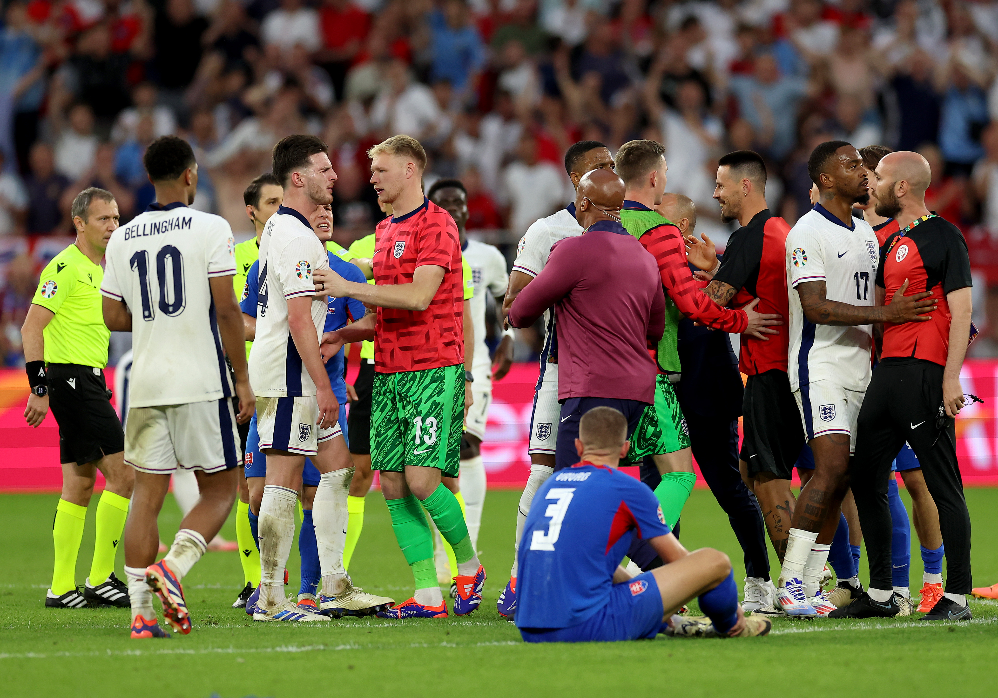 Declan Rice had to be held back during a clash with Slovakia staff at full-time