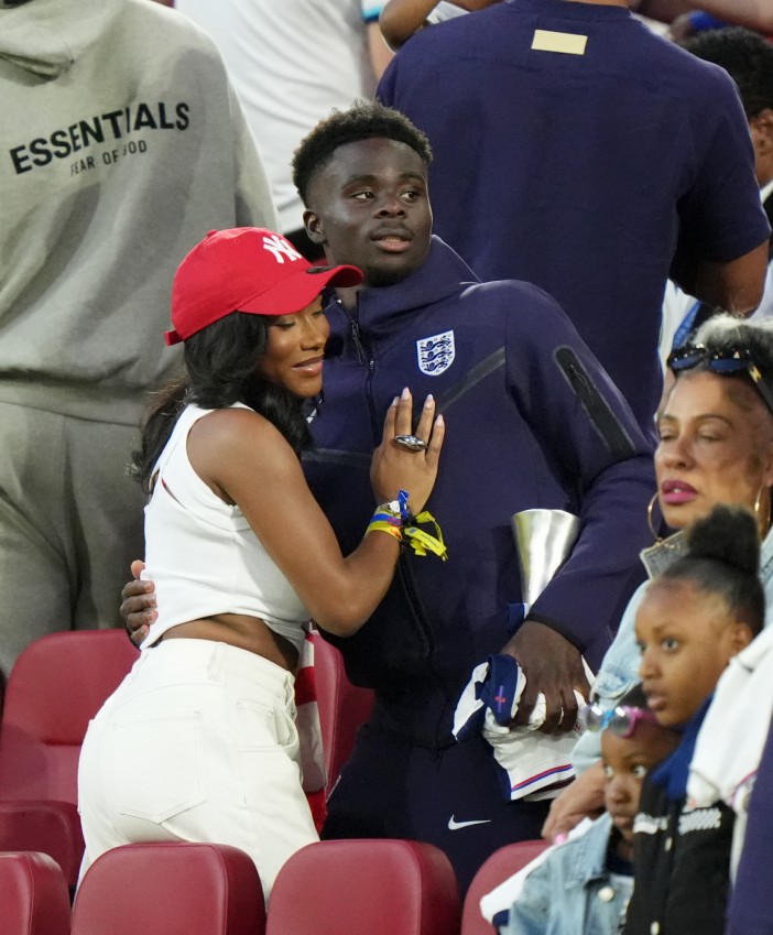 Bukayo Saka scored the equaliser and celebrated with his partner Tolami Benson