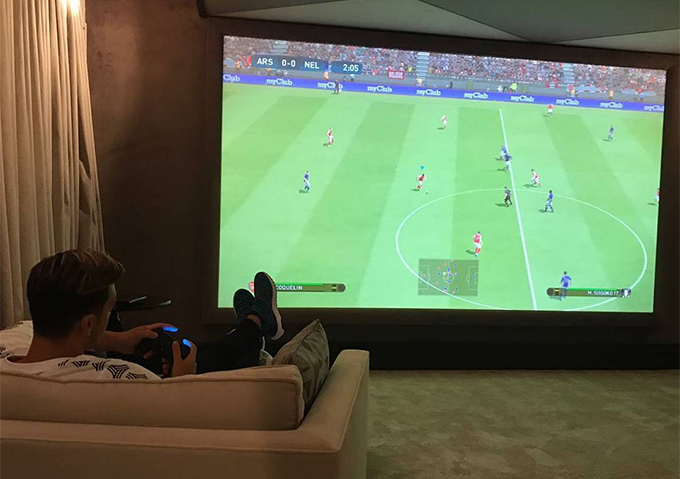 The villa has a cinema and games room for the Turkish midfielder's entertainment.