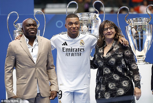 Mbappe had a photo with his parents - father Wilfried Mbappe and mother Fayza Lamari