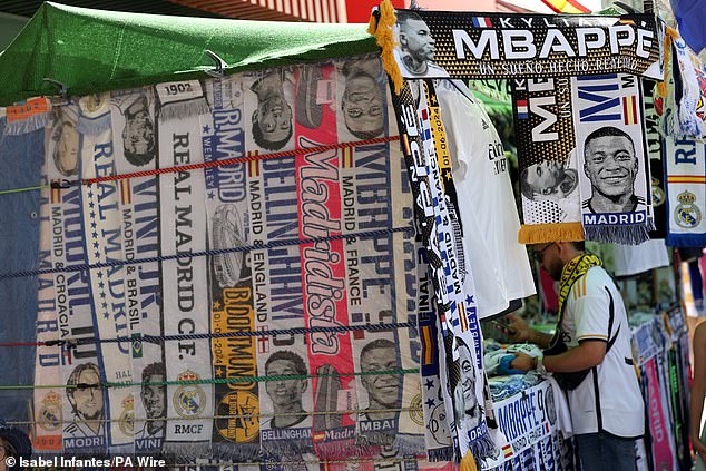 Vendors made sure to capitalise on the historic occasion by selling many scarves