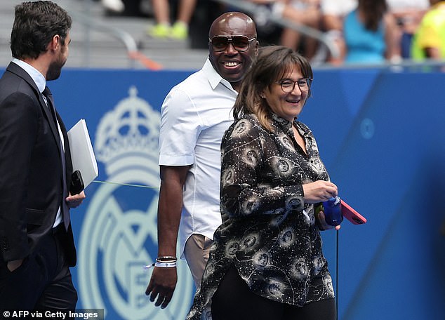 Mbappe's parents, Fayza Lamari (R) and Wilfrid Mbappe (L), walked out in front of the fans