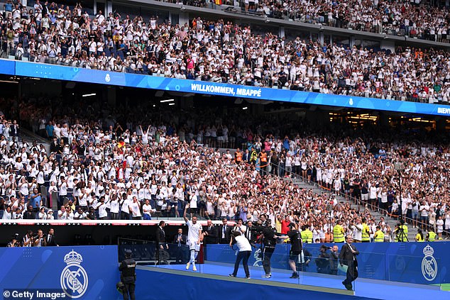 The stadium was packed out and fans gave Mbappe a hearty welcome as he emerged