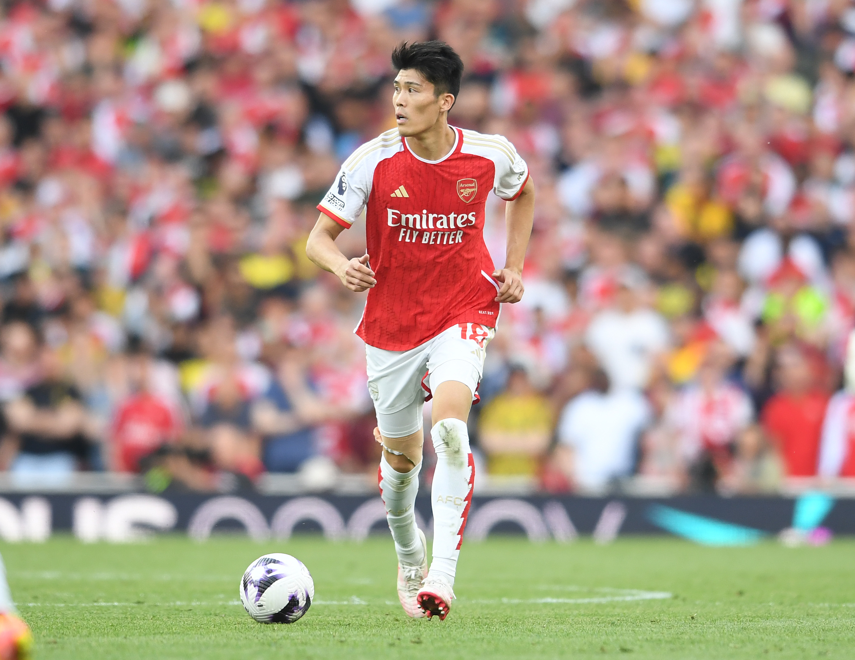 Takehiro Tomiyasu will miss Arsenal's USA tour to receive treatment on a knee problem