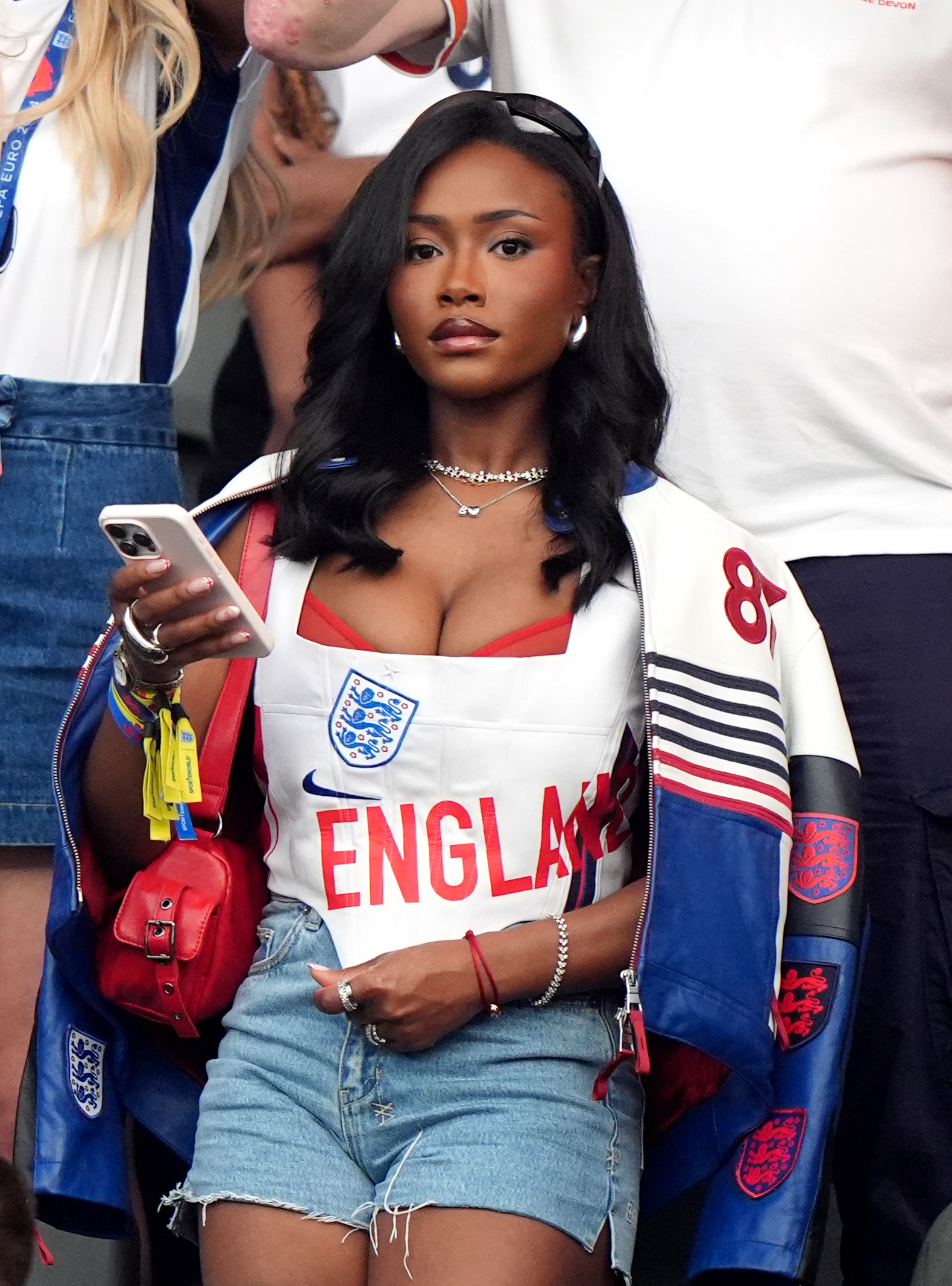 She sported a custom jacket with his first ever squad number on for one match