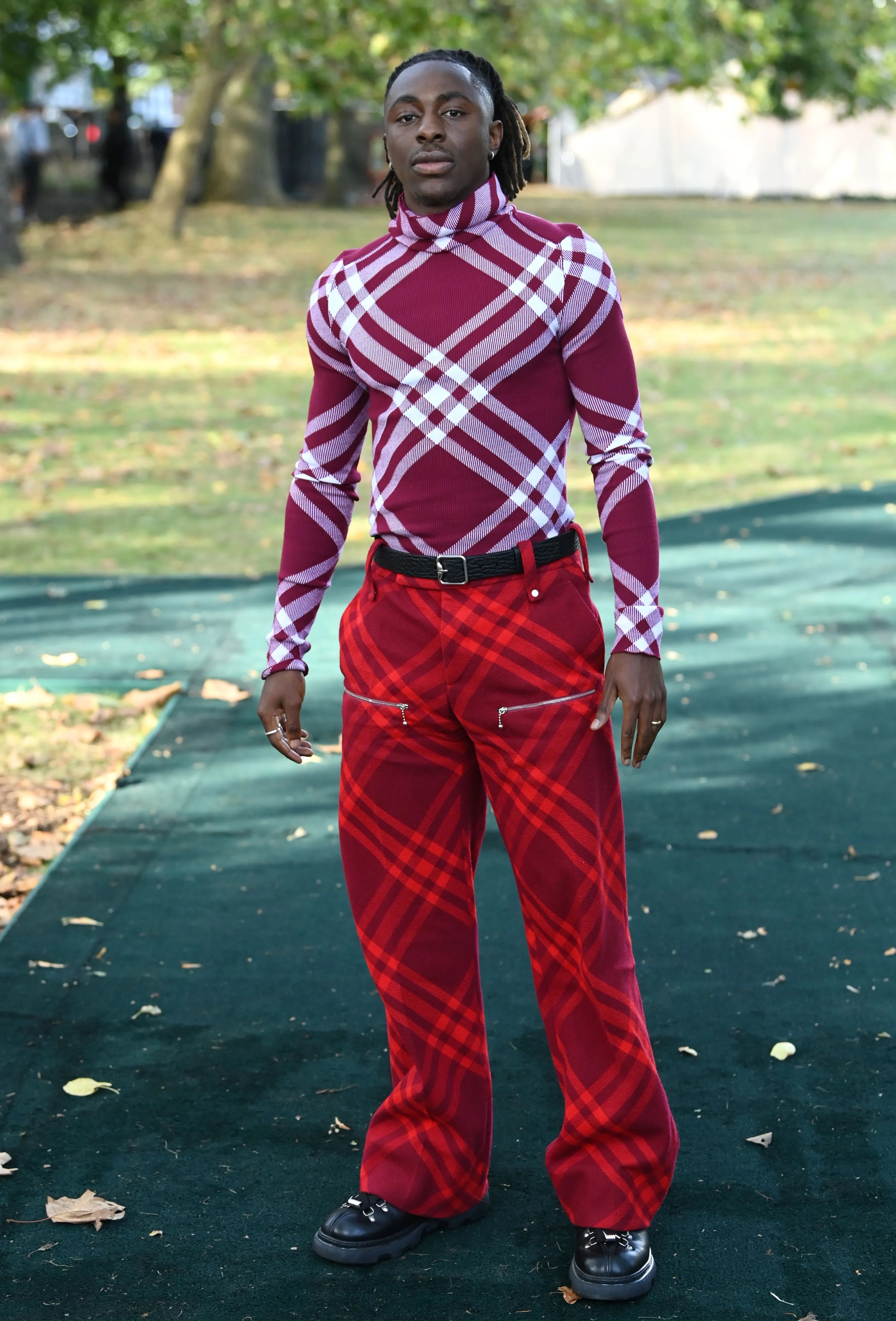 Eberechi Eze rocks this red combo at the Burberry Show